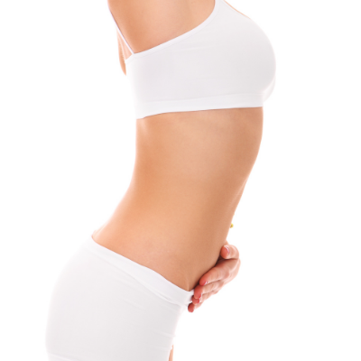 woman with hand on flat stomach after body contouring at Style and Beauty by Priscilla Dripping Springs